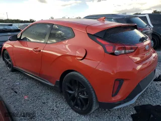 2019 Hyundai Veloster Turbo R-Spec with VIN KMHTH6AB0KU018904, listed as a Copart auction lot 77223314 with 82,877 mi miles and Salvage Title. Bid and sale history available at carsss.com. Image 2.