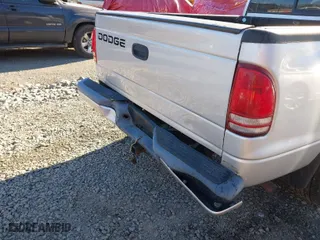 2001 Dodge Dakota Sport with VIN 1B7GL2AN21S158812, listed as a IAAI auction lot 41483542 with 175,135 mi miles. Bid and sale history available at carsss.com. Image 6.