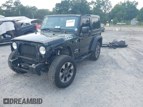 2017 Jeep Wrangler Sport z VIN 1C4AJWAG0HL618140, wystawiony jako IAAI lot #42582104 z przebiegiem 77 883 mil mil oraz . Historia ofert i sprzedaży dostępna na DreamBid. Obrazek 18.