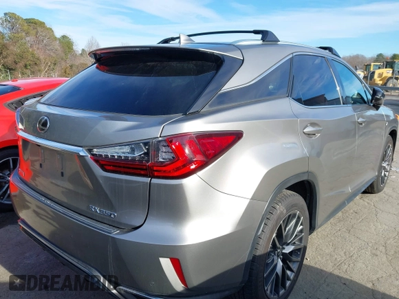 2018 Lexus RX 350 z VIN 2T2BZMCA0JC140434, wystawiony jako IAAI lot #41568796 z przebiegiem 104 143 mil mil oraz . Historia ofert i sprzedaży dostępna na DreamBid. Obrazek 4.
