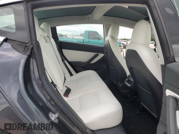 2018 Tesla Model 3 Long Range Battery z VIN 5YJ3E1EB2JF169809, wystawiony jako Copart lot #60623104 z przebiegiem 81 747 mil mil oraz Tytuł czysty. Historia ofert i sprzedaży dostępna na DreamBid. Obrazek 11.