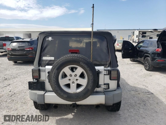 2008 Jeep Wrangler Sahara with VIN 1J4FA54148L561961, listed as a Copart auction lot 50770895 with 126,516 mi miles and Salvage title. Bid and sale history available at DreamBid. Image 6.