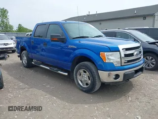 2013 Ford F-150 XL with VIN 1FTFW1EF9DFC72609, listed as a IAAI auction lot 42150526 with 229,000 mi miles. Bid and sale history available at carsss.com. Image 1.