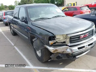 2003 GMC Sierra 1500 SLT with VIN 2GTEC19TX31404836, listed as a IAAI auction lot 42011067 with 233,458 mi miles and . Bid and sale history available at carsss.com. Image 1.