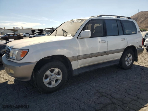1999 Toyota Land Cruiser with VIN JT3HT05J0X0059222, listed as a Copart auction lot 77713294 with 406,869 mi miles and Clean Title. Bid and sale history available at carsss.com. Image 1.