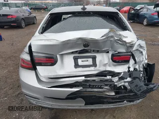 2018 BMW 3 Series 330i xDrive with VIN WBA8D9C55JA607605, listed as a IAAI auction lot 41682994 with 79,285 mi miles and . Bid and sale history available at DreamBid. Image 16.