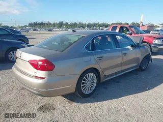 2016 Volkswagen Passat 1.8T SE w/Technology with VIN 1VWBS7A38GC018059, listed as a IAAI auction lot 41684959 with 44,850 mi miles. Bid and sale history available at carsss.com. Image 4.