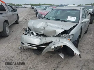 2003 Toyota Camry LE with VIN 4T1BE32K63U755835, listed as a IAAI auction lot 41976402 with 215,788 mi miles and . Bid and sale history available at DreamBid. Image 17.