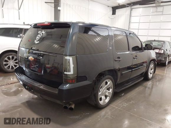 2007 Chevrolet Tahoe LS with VIN 1GNFC13C87R394003, listed as a IAAI auction lot 42206597 with 147,358 mi miles and . Bid and sale history available at DreamBid. Image 4.