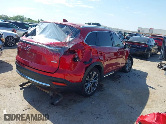 2021 Mazda CX-9 Signature with VIN JM3TCBEY9M0500122, listed as a IAAI auction lot 42252561 with 46,154 mi miles and . Bid and sale history available at DreamBid. Image 4.