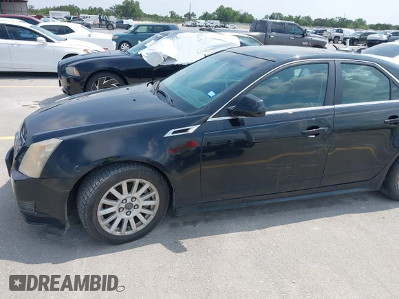 2013 Cadillac CTS Luxury with VIN 1G6DE5E50D0101763, listed as a IAAI auction lot 42090577 with 105,097 mi miles and . Bid and sale history available at DreamBid. Image 6.