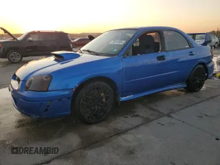 2005 Subaru Impreza Sedan (Natl) WRX STi w/Gold Wheels with VIN JF1GD70695L505952, listed as a Copart auction lot 76518304 with 173,385 mi miles and Salvage Title. Bid and sale history available at carsss.com. Image 1.