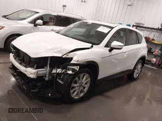 2015 Mazda CX-5 Grand Touring with VIN JM3KE4DY4F0495627, listed as a IAAI auction lot 41887773 with 130,421 mi miles. Bid and sale history available at carsss.com. Image 19.