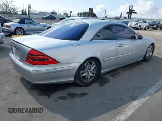 2001 Mercedes-Benz CL-Class with VIN WDBPJ75J91A015029, listed as a IAAI auction lot 41548689 with 100,822 mi miles. Bid and sale history available at carsss.com. Image 4.