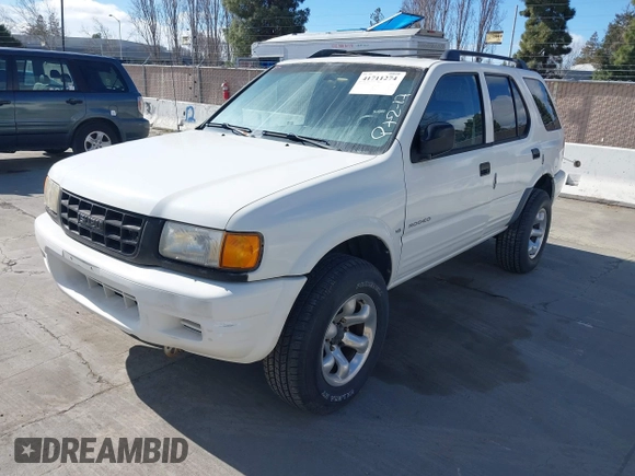 1998 Isuzu Rodeo S z VIN 4S2CK58W4W4308419, wystawiony jako IAAI lot #41711274 z przebiegiem 128 853 mil mil oraz . Historia ofert i sprzedaży dostępna na DreamBid. Obrazek 2.