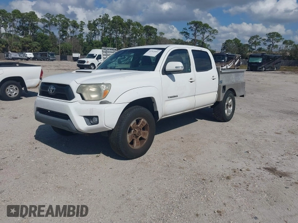 2014 Toyota Tacoma PreRunner with VIN 3TMJU4GN2EM169071, listed as a IAAI auction lot 41543601 with 304,594 mi miles. Bid and sale history available at carsss.com. Image 2.