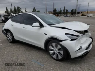 2024 Tesla Model Y Long Range with VIN 7SAYGDEE8RF088808, listed as a Copart auction lot 50406865 with 8,150 mi miles and Salvage title. Bid and sale history available at DreamBid. Image 4.