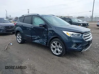 2019 Ford Escape Titanium with VIN 1FMCU9J95KUC28621, listed as a IAAI auction lot 41825297 with 60,373 mi miles. Bid and sale history available at carsss.com. Image 1.