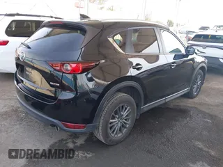 2020 Mazda CX-5 Touring with VIN JM3KFACM0L0804998, listed as a IAAI auction lot 41850998 with 44,519 mi miles. Bid and sale history available at carsss.com. Image 4.