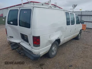 2004 Ford Econoline Cargo with VIN 1FTRE14WX4HA06537, listed as a IAAI auction lot 41745018 with 246,963 mi miles. Bid and sale history available at carsss.com. Image 4.