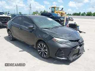 2017 Toyota Corolla L z VIN 5YFBURHE9HP576513, wystawiony jako IAAI lot #42460720 z przebiegiem 217 852 mil mil oraz . Historia ofert i sprzedaży dostępna na DreamBid. Obrazek 1.