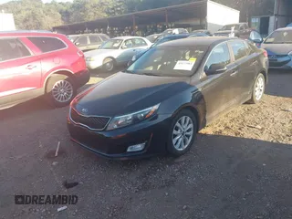 2015 Kia Optima LX z VIN KNAGM4A71F5629636, wystawiony jako IAAI lot #41677983 z przebiegiem 150 600 mil mil oraz . Historia ofert i sprzedaży dostępna na DreamBid. Obrazek 2.