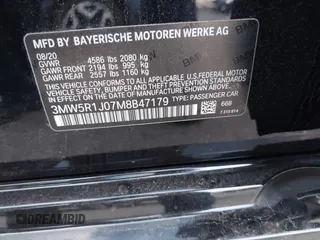 2021 BMW 3 Series 330i with VIN 3MW5R1J07M8B47179, listed as a IAAI auction lot 41450153 with 66,689 mi miles. Bid and sale history available at carsss.com. Image 9.