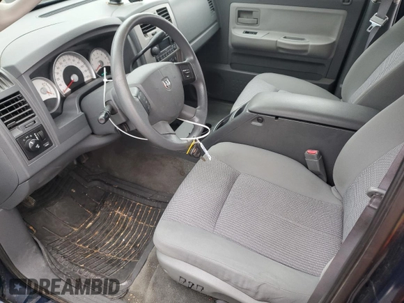 2007 Dodge Dakota SLT with VIN 1D7HE48K27S121781, listed as a Copart auction lot 43204335 with 157,654 mi miles and Salvage Title. Bid and sale history available at DreamBid. Image 7.