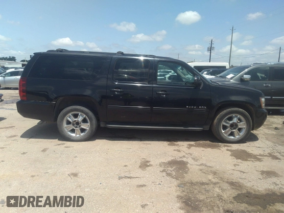 2013 Chevrolet Suburban LT with VIN 1GNSCJE05DR142688, listed as a IAAI auction lot 42214548 with 236,464 mi miles and . Bid and sale history available at DreamBid. Image 13.
