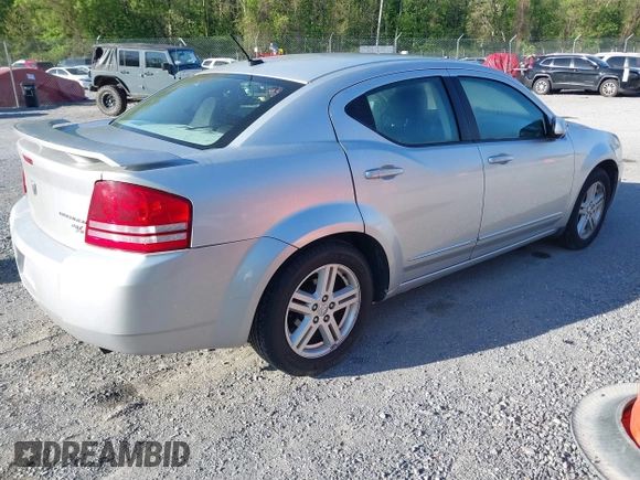 2010 Dodge Avenger R/T with VIN 1B3CC5FB2AN234415, listed as a IAAI auction lot 42123386 with 145,560 mi miles and . Bid and sale history available at DreamBid. Image 4.