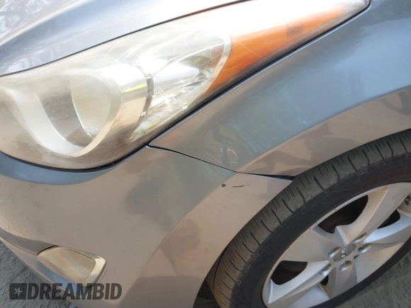 2012 Hyundai Elantra GLS z VIN KMHDH4AE7CU369345, wystawiony jako IAAI lot #42432765 z przebiegiem 148 754 mil mil oraz . Historia ofert i sprzedaży dostępna na DreamBid. Obrazek 6.