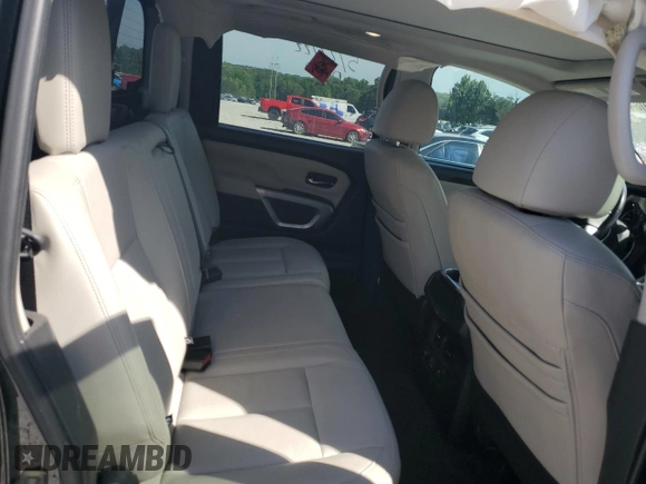 2021 Nissan Titan SL z VIN 1N6AA1ED6MN511883, wystawiony jako Copart lot #57115084 z przebiegiem 48 293 mil mil oraz Szkoda całkowita • Salvage title. Historia ofert i sprzedaży dostępna na DreamBid. Obrazek 10.