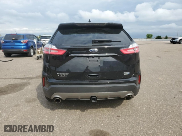 2019 Ford Edge SEL with VIN 2FMPK4J93KBC26513, listed as a Copart auction lot 59301295 with 58,364 mi miles and Salvage title. Bid and sale history available at DreamBid. Image 6.