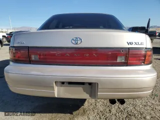 1994 Toyota Camry XLE with VIN JT2GK13E0R0017831, listed as a Copart auction lot 49887485 with 143,303 mi miles and Salvage Title. Bid and sale history available at carsss.com. Image 6.