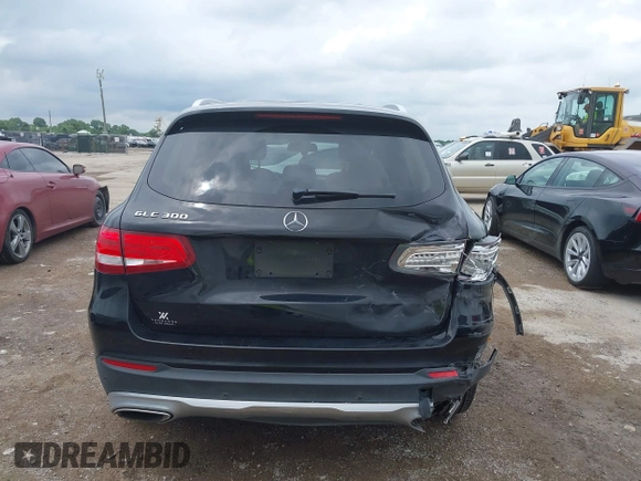2019 Mercedes-Benz GLC 300 with VIN WDC0G4JB6KV185786, listed as a IAAI auction lot 42472450 with 86,561 mi miles and . Bid and sale history available at DreamBid. Image 16.
