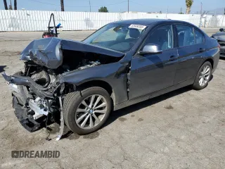 2018 BMW 3 Series 320i with VIN WBA8A9C51JAD26901, listed as a Copart auction lot 52609285 with 36,344 mi miles and Salvage Title. Bid and sale history available at carsss.com. Image 1.