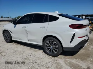 2022 BMW X6 xDrive40i with VIN 5UXCY6C06N9J13344, listed as a Copart auction lot 49278715 with 83,632 mi miles and Clean Title. Bid and sale history available at carsss.com. Image 2.