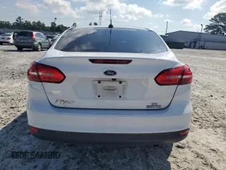 2015 Ford Focus SE with VIN 1FADP3F22FL218056, listed as a Copart auction lot 63093805 with 145,824 mi miles and Clean title. Bid and sale history available at DreamBid. Image 6.