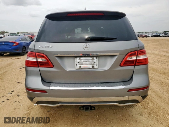 2014 Mercedes-Benz M 350 with VIN 4JGDA5JB9EA327618, listed as a Copart auction lot 63082525 with 162,307 mi miles and Salvage title. Bid and sale history available at DreamBid. Image 6.