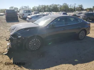 2022 Hyundai Sonata Hybrid SEL with VIN KMHL34JJ1NA047943, listed as a Copart auction lot 76263234 with 54,065 mi miles and Salvage Title. Bid and sale history available at carsss.com. Image 1.