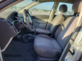 2007 Ford Focus S with VIN 1FAFP34N87W278008, listed as a Copart auction lot 61022545 with 139,575 mi miles and Salvage title. Bid and sale history available at DreamBid. Image 7.
