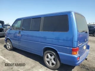 2003 Volkswagen EuroVan с VIN WV2KB470X3H028721, выставлен на аукционе Copart как лот 57531425 с пробегом 233 629 миль миль и Чистый • Clean title. История ставок и продаж доступна на DreamBid. Изображение 2.