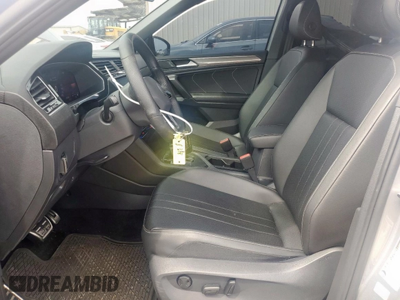 2023 Volkswagen Tiguan SE R-Line Black with VIN 3VVCB7AX5PM128335, listed as a Copart auction lot 56128305 with 21,524 mi miles and Salvage title. Bid and sale history available at DreamBid. Image 7.