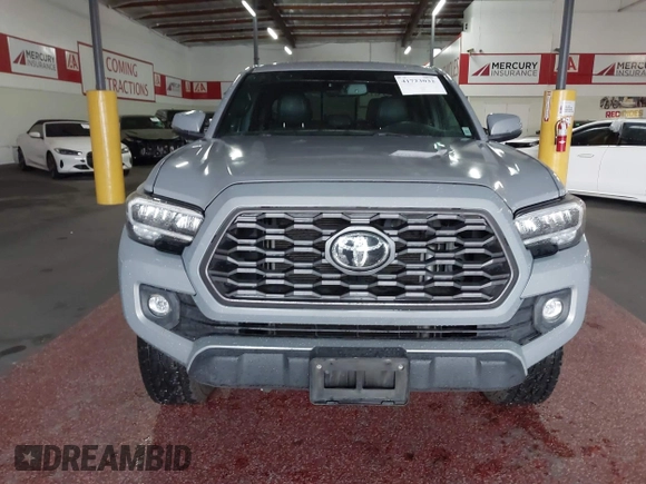 2021 Toyota Tacoma SR5 z VIN 3TMDZ5BN5MM114494, wystawiony jako IAAI lot #41723032 z przebiegiem 54 477 mil mil oraz . Historia ofert i sprzedaży dostępna na DreamBid. Obrazek 12.