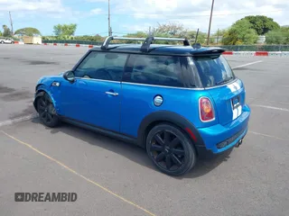 2010 MINI Hardtop S with VIN WMWMF7C51ATW89883, listed as a IAAI auction lot 42281047 with 121,847 mi miles and . Bid and sale history available at DreamBid. Image 3.