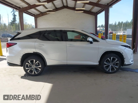 2021 Lexus RX with VIN JTJHZKFA2M2030841, listed as a IAAI auction lot 42009263 with 38,113 mi miles. Bid and sale history available at carsss.com. Image 14.