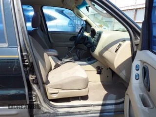 2007 Ford Escape XLS с VIN 1FMYU02ZX7KB08803, выставлен на аукционе IAAI как лот 41878290 с пробегом 163 983 миль миль и . История ставок и продаж доступна на DreamBid. Изображение 5.