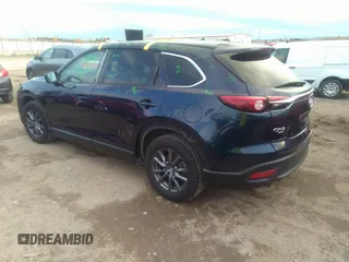 2021 Mazda CX-9 Sport with VIN JM3TCBBY4M0519407, listed as a IAAI auction lot 40883497 with 90,205 mi miles and . Bid and sale history available at carsss.com. Image 3.