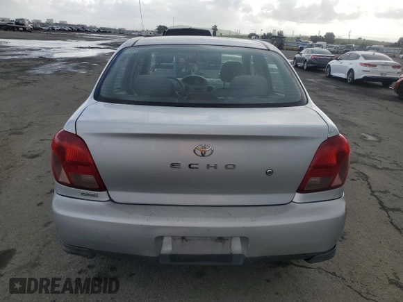 2002 Toyota ECHO with VIN JTDBT123420202436, listed as a Copart auction lot 48917245 with 114,865 mi miles and Salvage title. Bid and sale history available at DreamBid. Image 6.