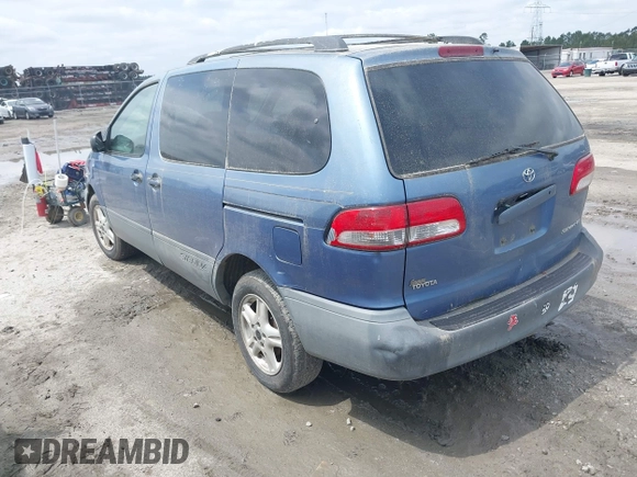 2002 Toyota Sienna LE with VIN 4T3ZF13C52U504124, listed as a IAAI auction lot 42223098 with 188,413 mi miles and . Bid and sale history available at DreamBid. Image 3.